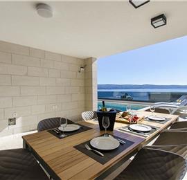 5 bedroom beachfront villa with heated pool near Omis, sleeps 9